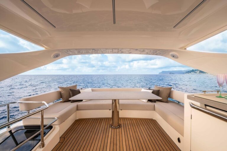 dining table and seating on flybridge aft deck of navetta 50