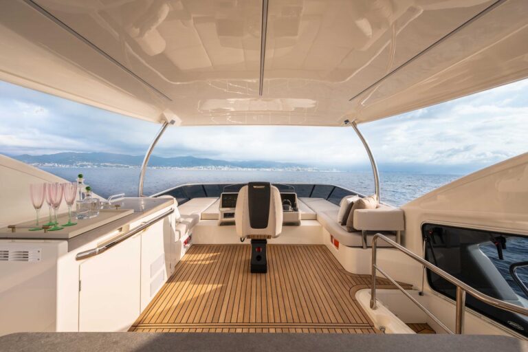 flybridge deck with champagne glasses on wet bar