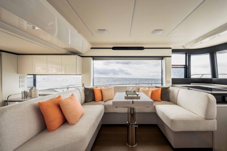 navetta 50 dining table and sofas in salon of navetta 50