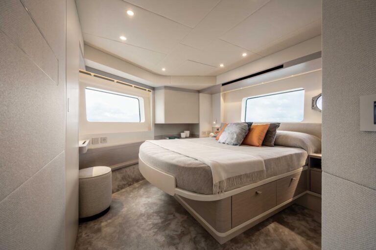 vip cabin with center berth and multiple windows in navetta 50
