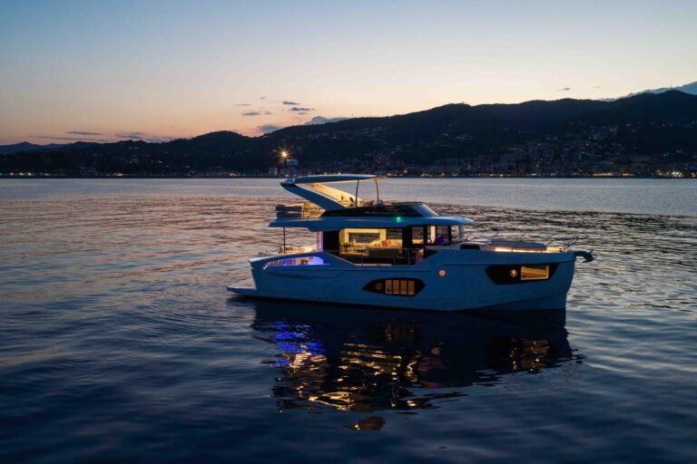 nighttime image of absolute navetta 50 lit up