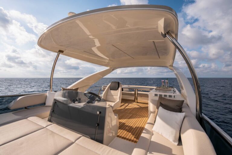 spacious seating around flybridge helm of navetta 50