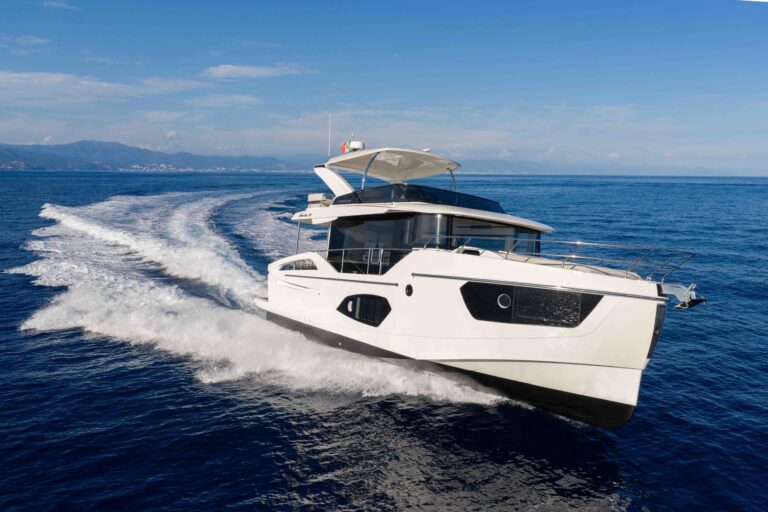 starboard side profile image of navetta 50 cruising in water