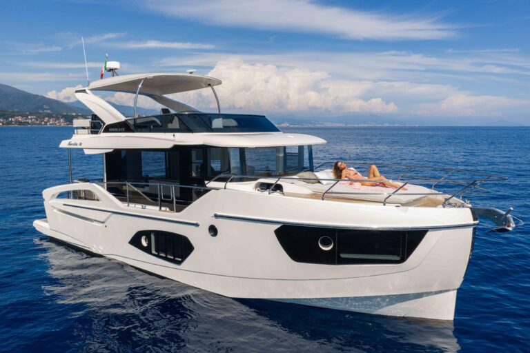 woman laying on bow sunpads of navetta 50